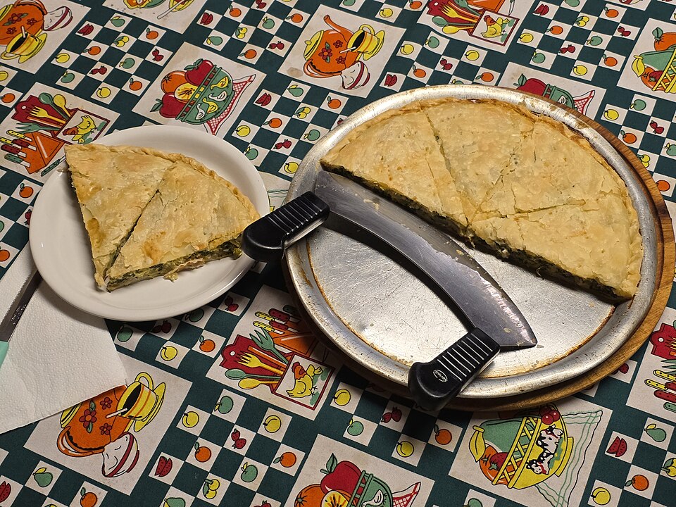 Tarta de yogurt con salsa de frutos rojos